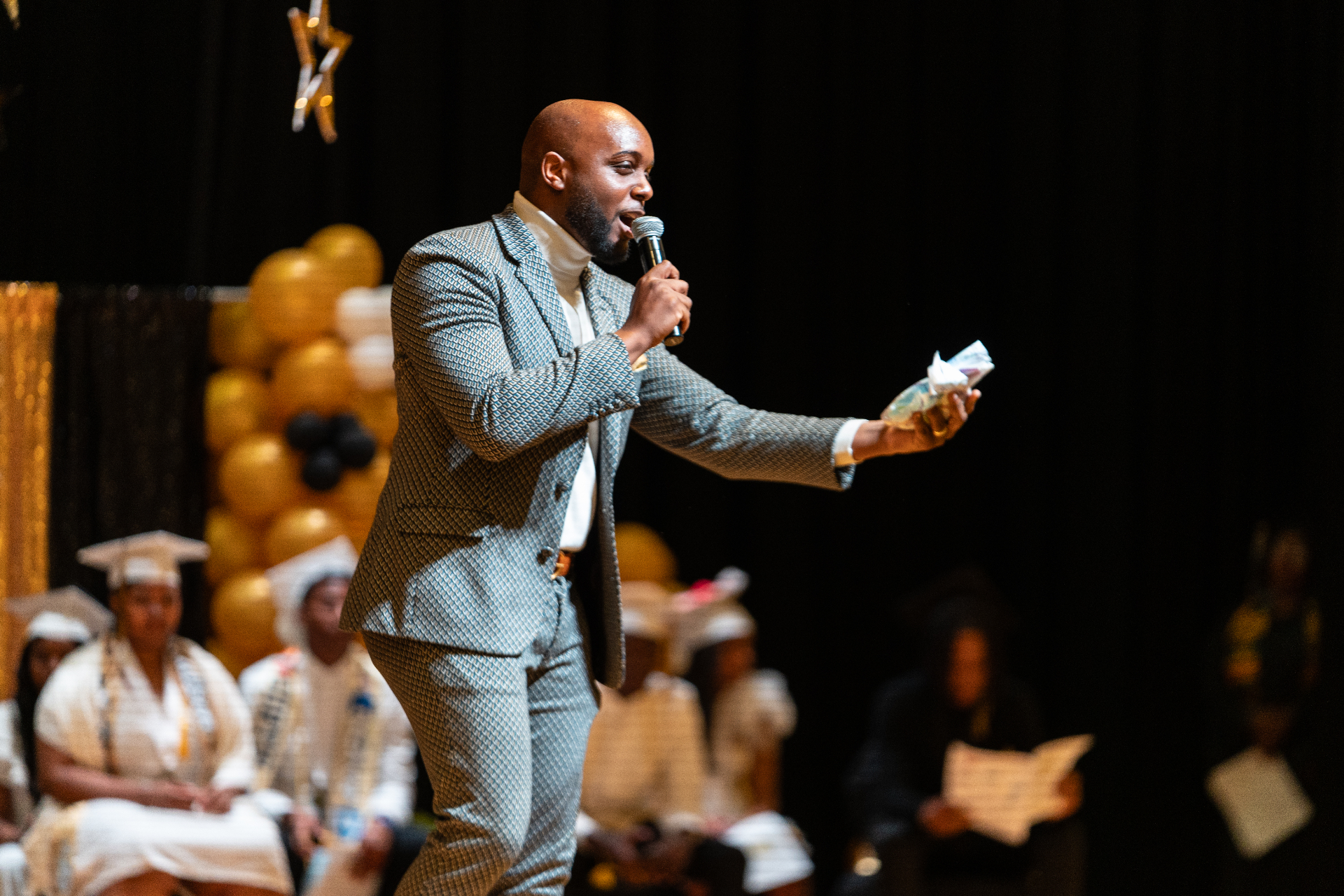 Fred Joe Jones speaking on stage